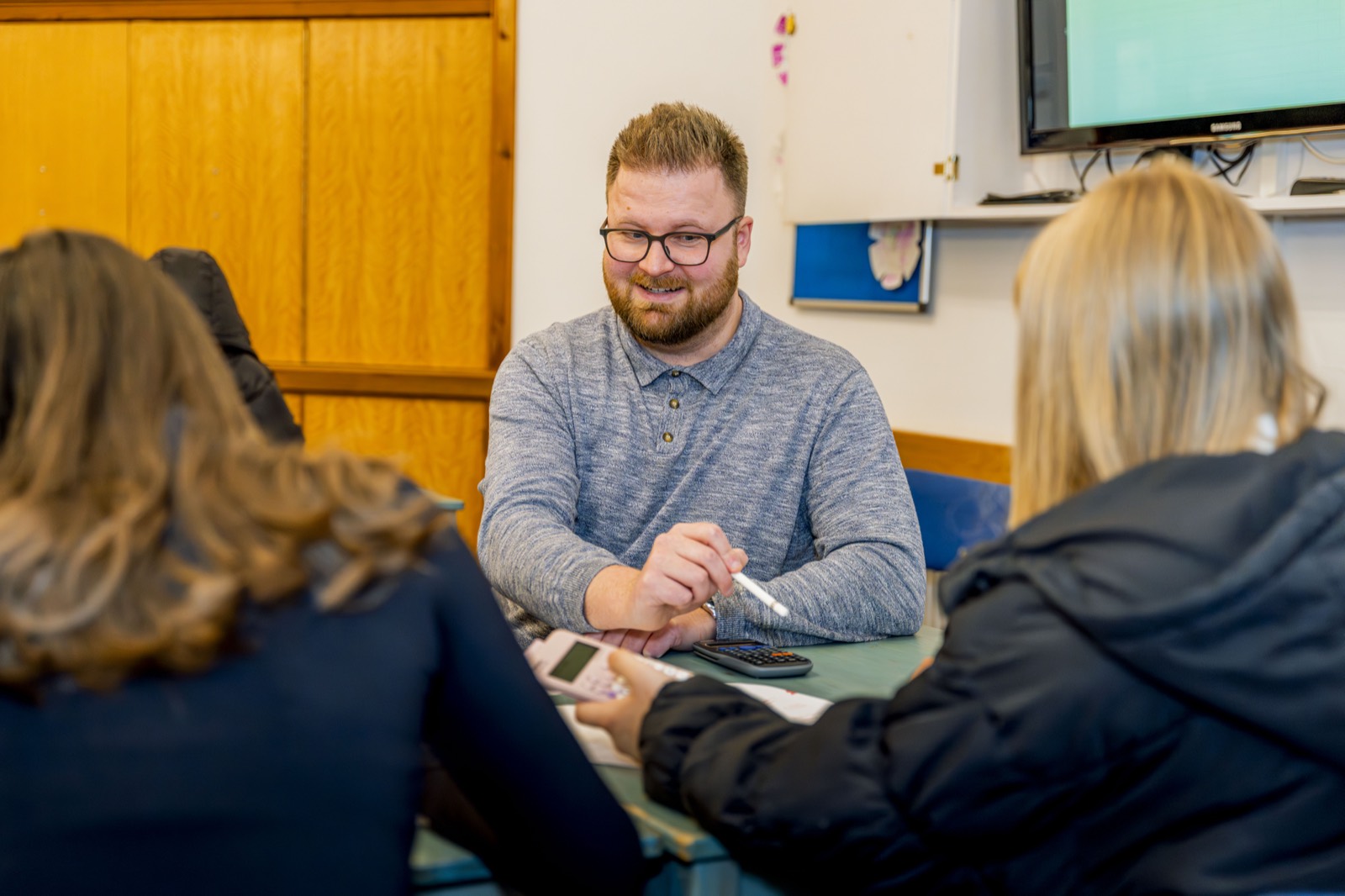 A Restart Tuition tutor delivering Alternative Provision support to two students