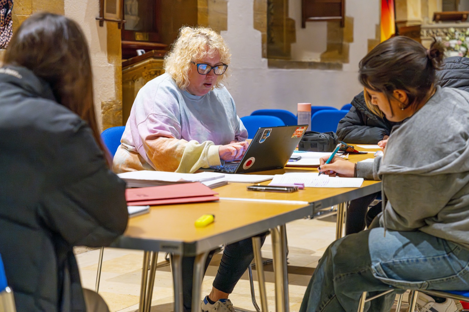 A Restart Tuition tutor working through a session with students